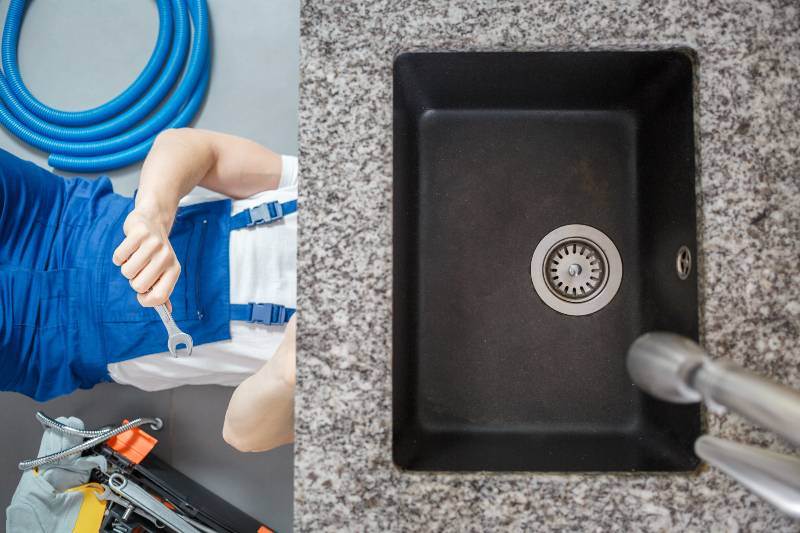 A Victor Plumbing plumber is working on a sink with a plumber's hose.